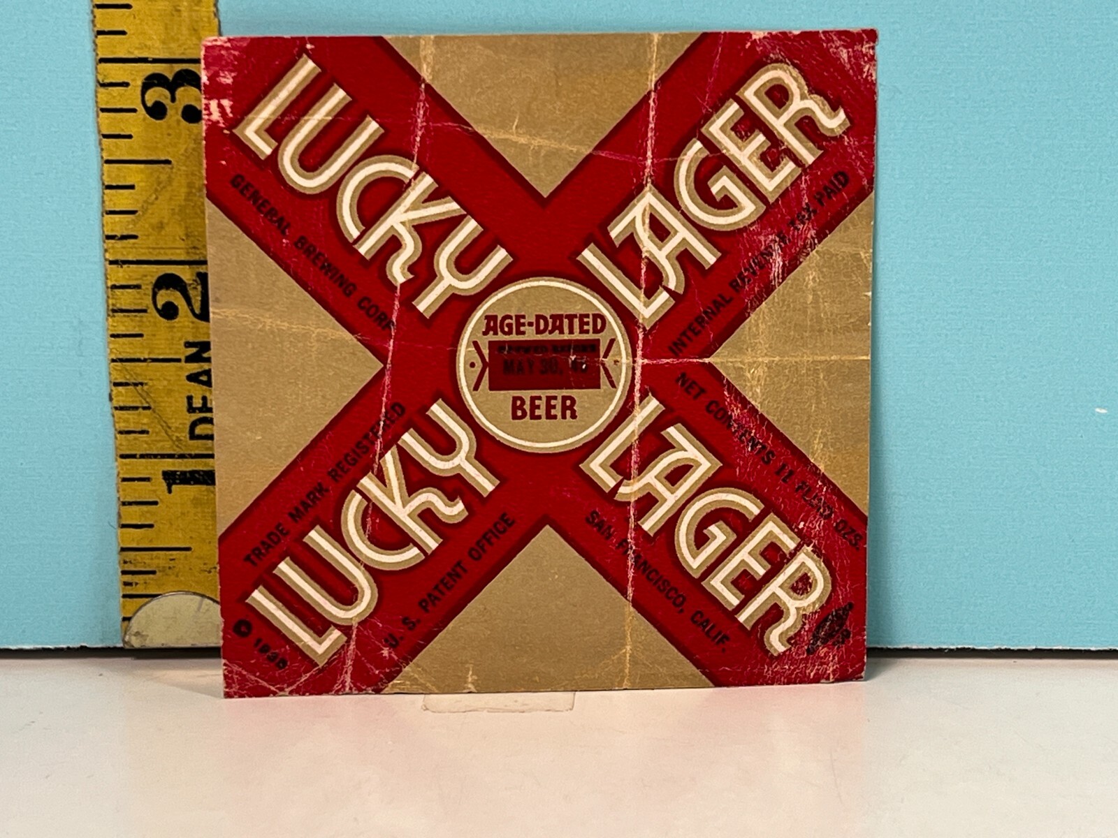 Vintage Lucky Lager Age Dated foil bottle label.