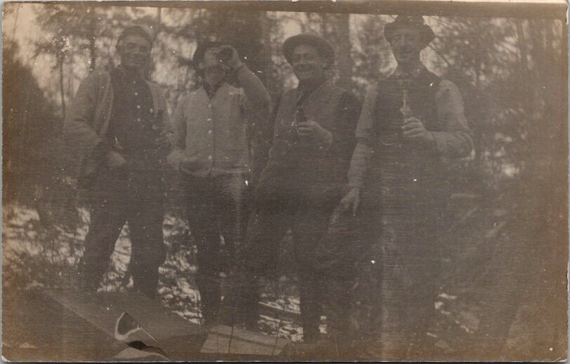 RPPC Postcard Group of Hunters Drink Cold Beer after Days Hunt c.1904-1918  Q391
