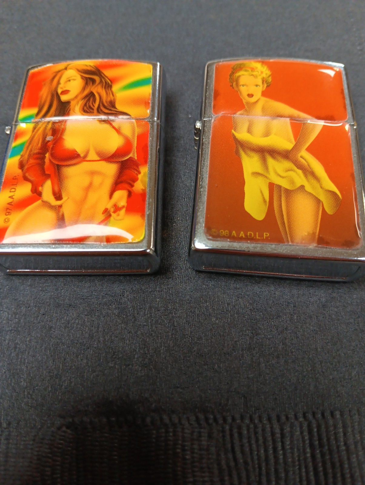 2 ORANGE YELLOW BIKINI BUSTY SEXY PINUP GIRLS LIGHTERS MINT 2 ORANGE YELLOW BIKINI BUSTY SEXY PINUP GIRLS LIGHTERS MINT