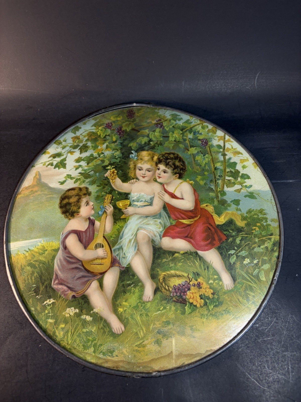 Antique Flue Cover 9” Three Children Playing & Eating Grapes- Broken Rim,water