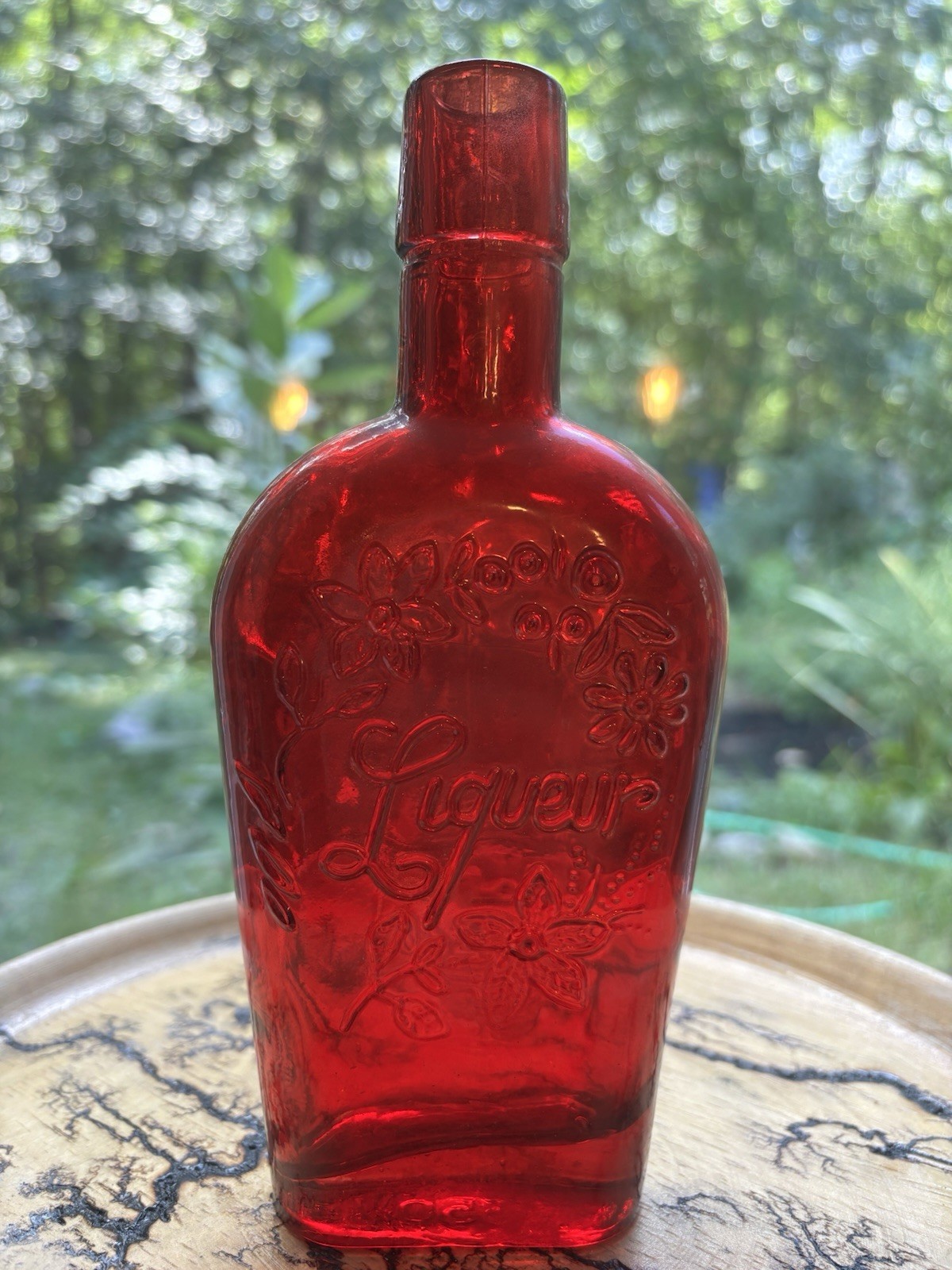 Vtg Wheaton Ruby Red glass liquor bottle embossed florals & the word 