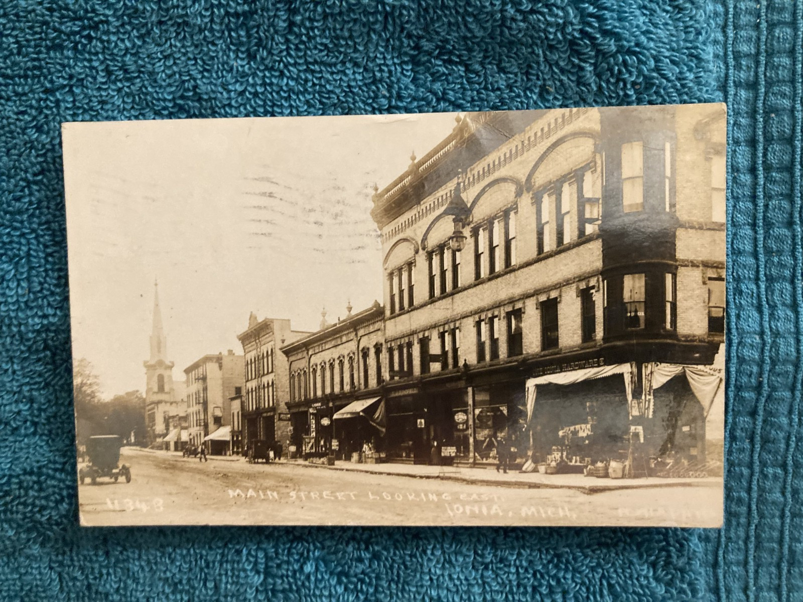 RPPC Main Street Looking East Ionia Michigan Posted 1912 Grand Rapids Pesha RPPC Main Street Looking East Ionia Michigan Posted 1912 Grand Rapids Pesha