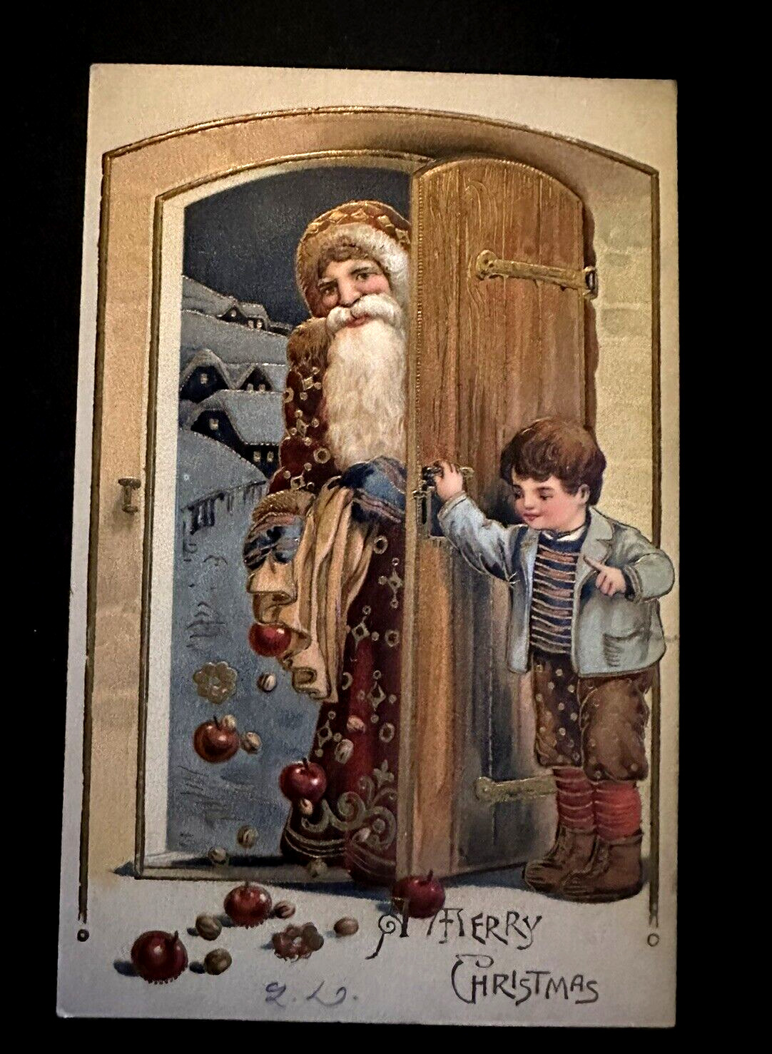 Brown Robe Santa Claus~at Door with Child~Fruit~PFB 1910~Christmas Postcard~k438