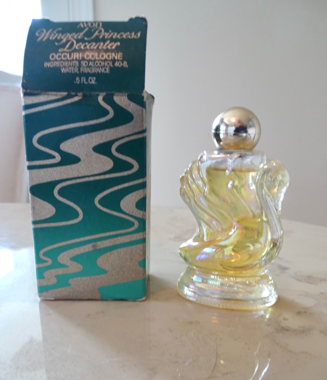 Vintage Avon Occuri Cologne Winged Princess Decanter  .5 FL OZ