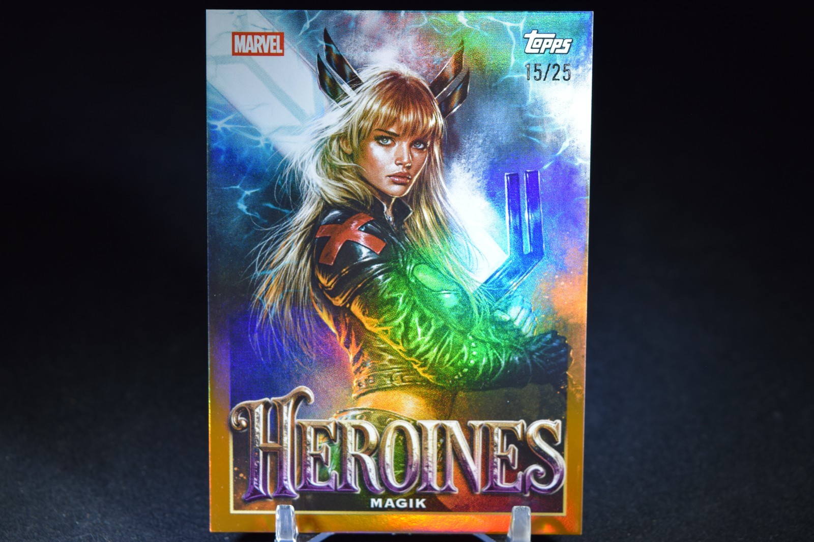 2026 Topps Marvel Neon Heroines Magik Orange Refractor 15/25