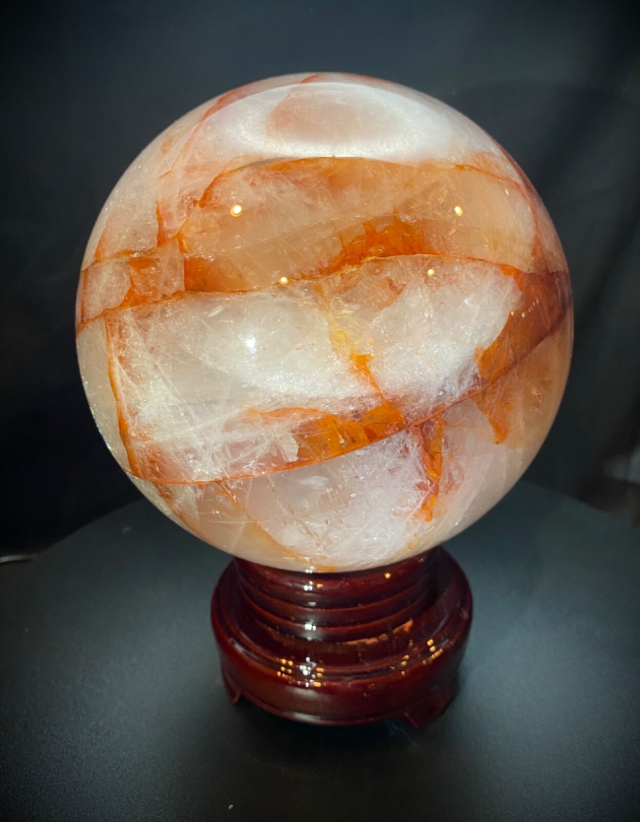 Jumbo Fire Quartz Sphere with wood swivel stand 5.5 inches 8 pounds 4.7 ounces