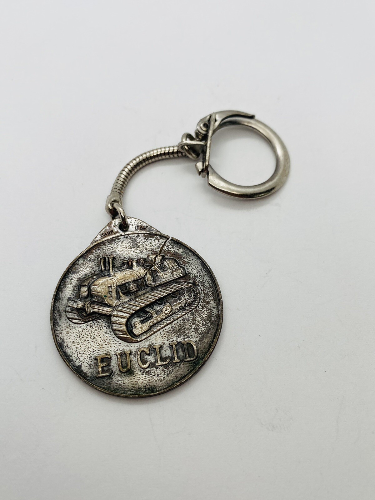 VINTAGE EUCLID TRACTORS KEYCHAIN COIN TOKEN USED VINTAGE EUCLID TRACTORS KEYCHAIN COIN TOKEN USED