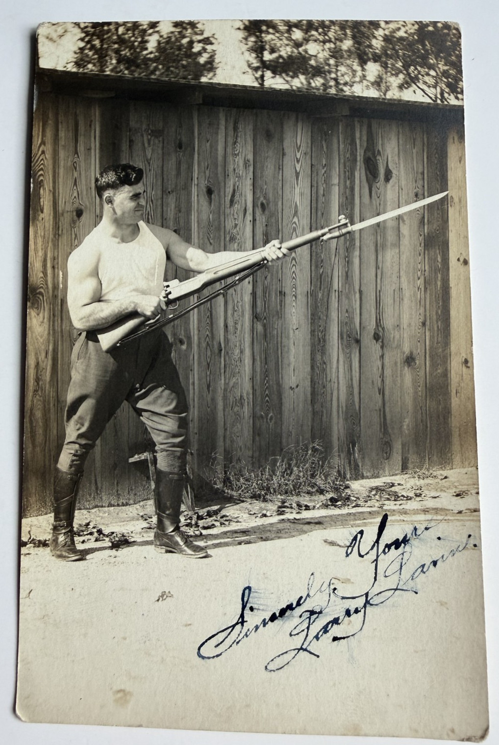 c1910s WWI Era RPPC Strongman Soldier Posing with Rifle Bayonet Signed Postcard