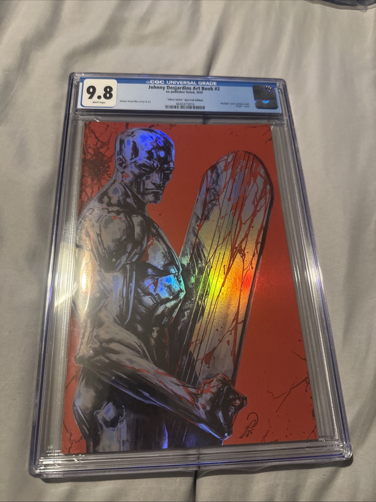 Johnny Desjardins Art Book #2 CGC 9.8 Silver Surfer Bloody Red Foil SDCC Ltd 50 Johnny Desjardins Art Book #2 CGC 9.8 Silver Surfer Bloody Red Foil SDCC Ltd 50