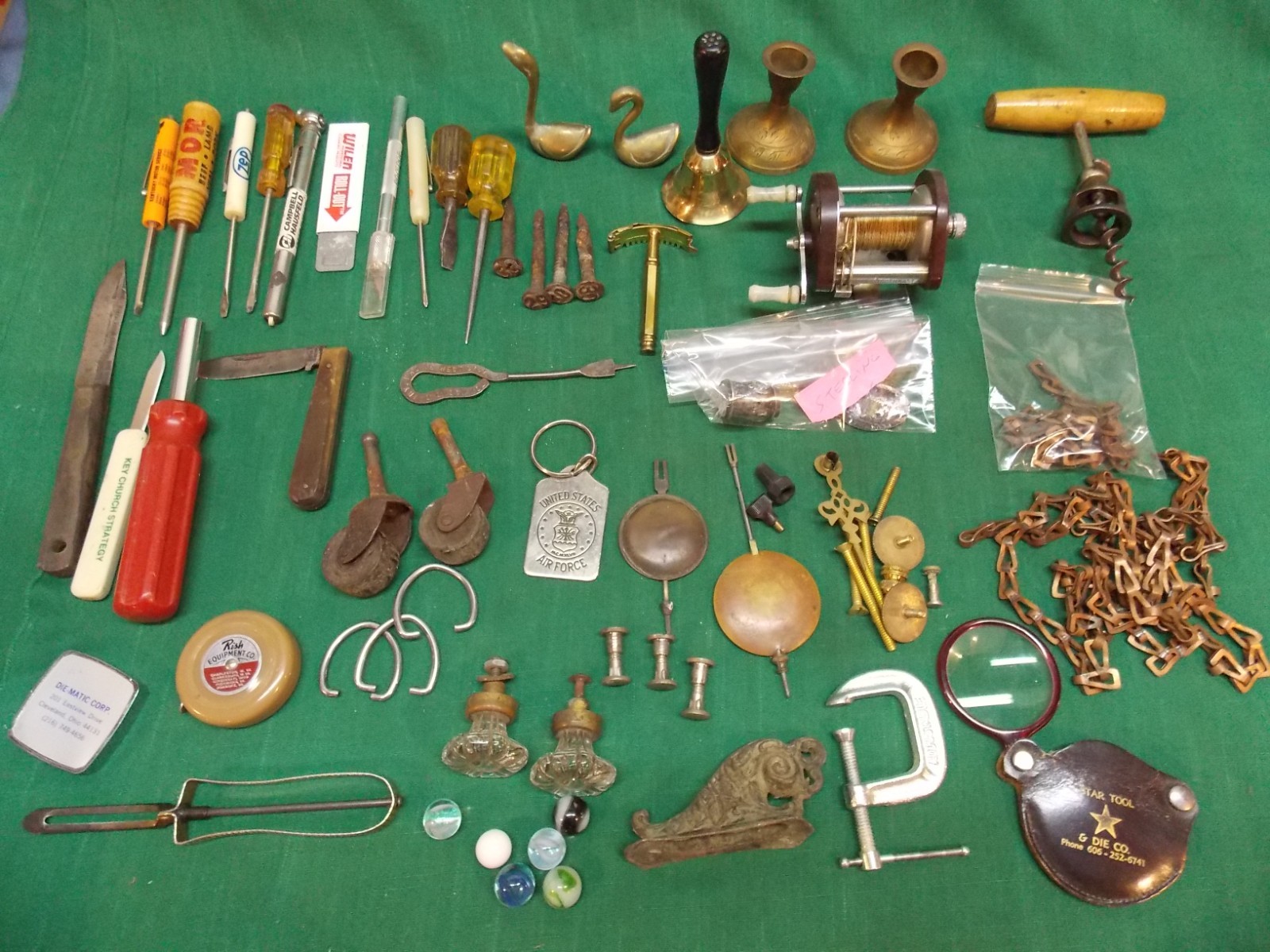 Lot of old junk drawer items. Garage, tools, kitchen, collectibles, fishing reel