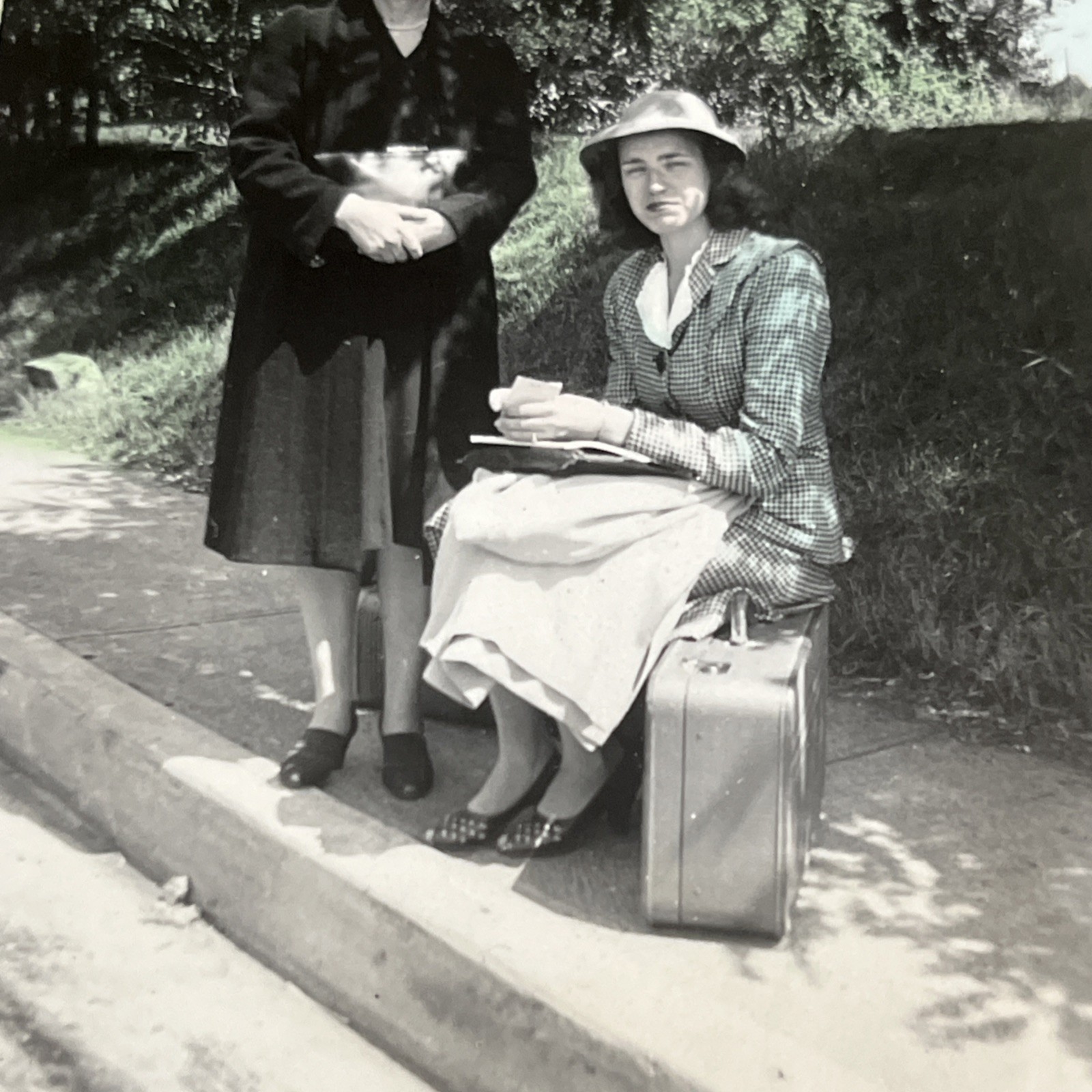 Vintage Snapshot Lady Sitting on Suitcase 1940s Waiting on Ride Sidewalk - U3