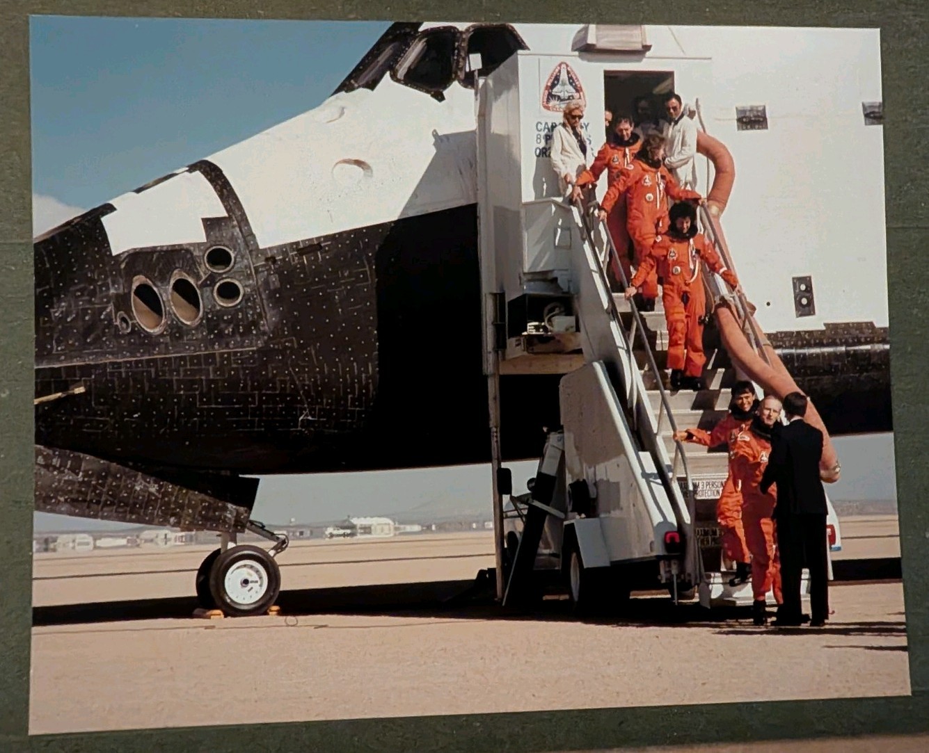 1989 NASA Photo Space Shuttle Atlantis STS-34 Crew Egress Orange Suits 8x10