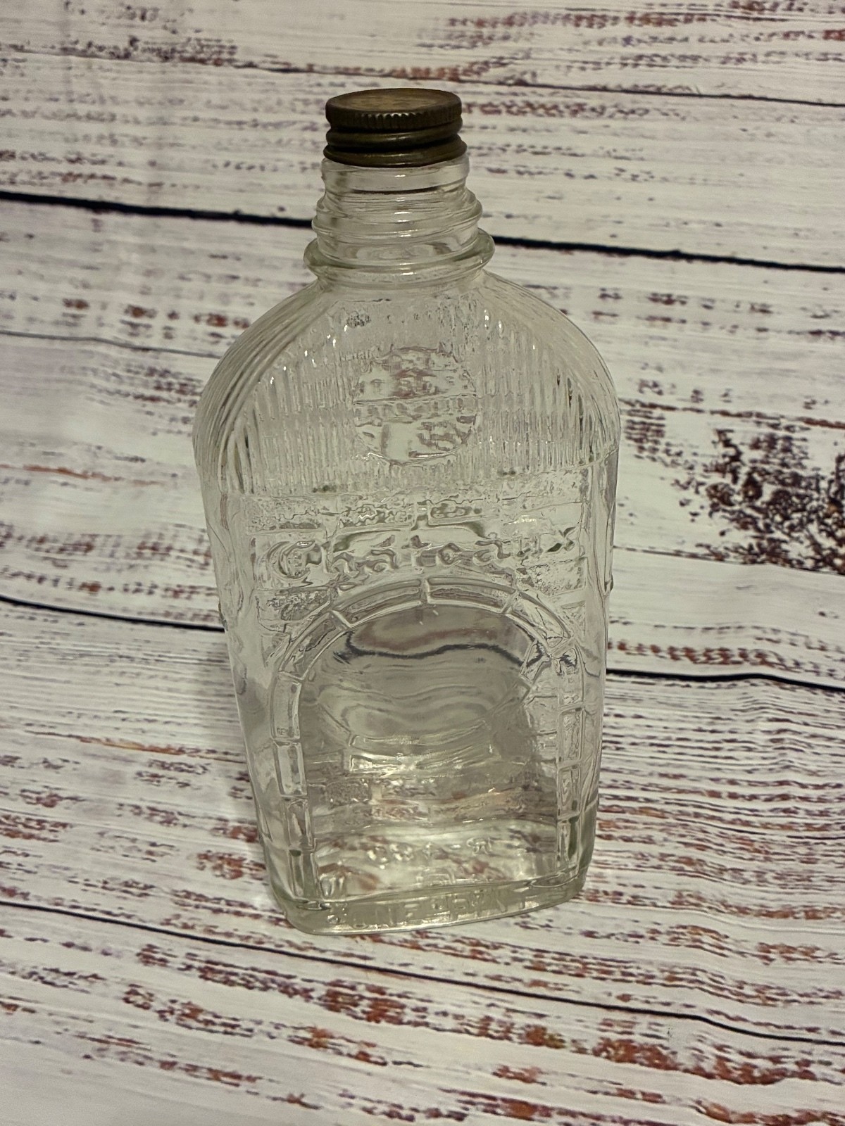 Vintage Clear Embossed Glass Bottle with Metal Cap
