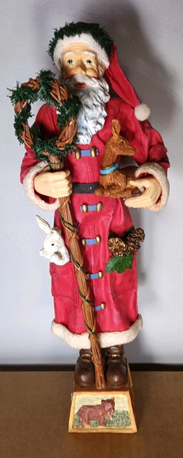 VINTAGE folk art style Santa Claus figurine wearing a Paper Style Coat Resin 