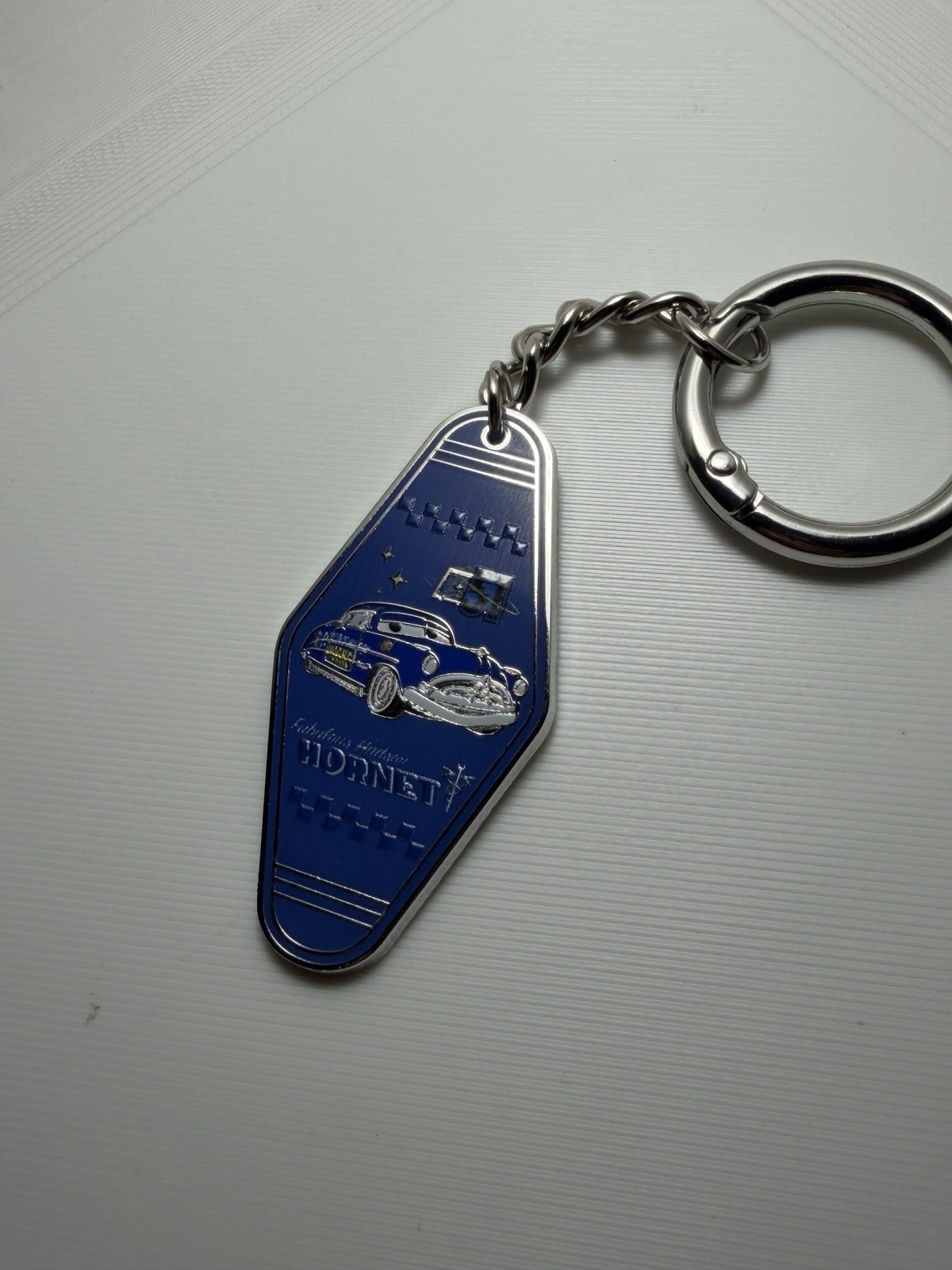 BoxLunch Disney Pixar Cars Blind Box Motel Keychain - Doc Hudson