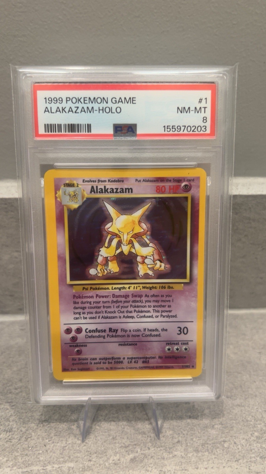 1999 Pokemon Game Alakazam Holo #1 English PSA 8 Pokémon Card