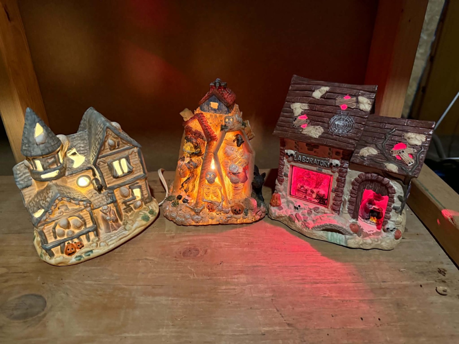 three vintage lighted ceramic Halloween village houses, 
