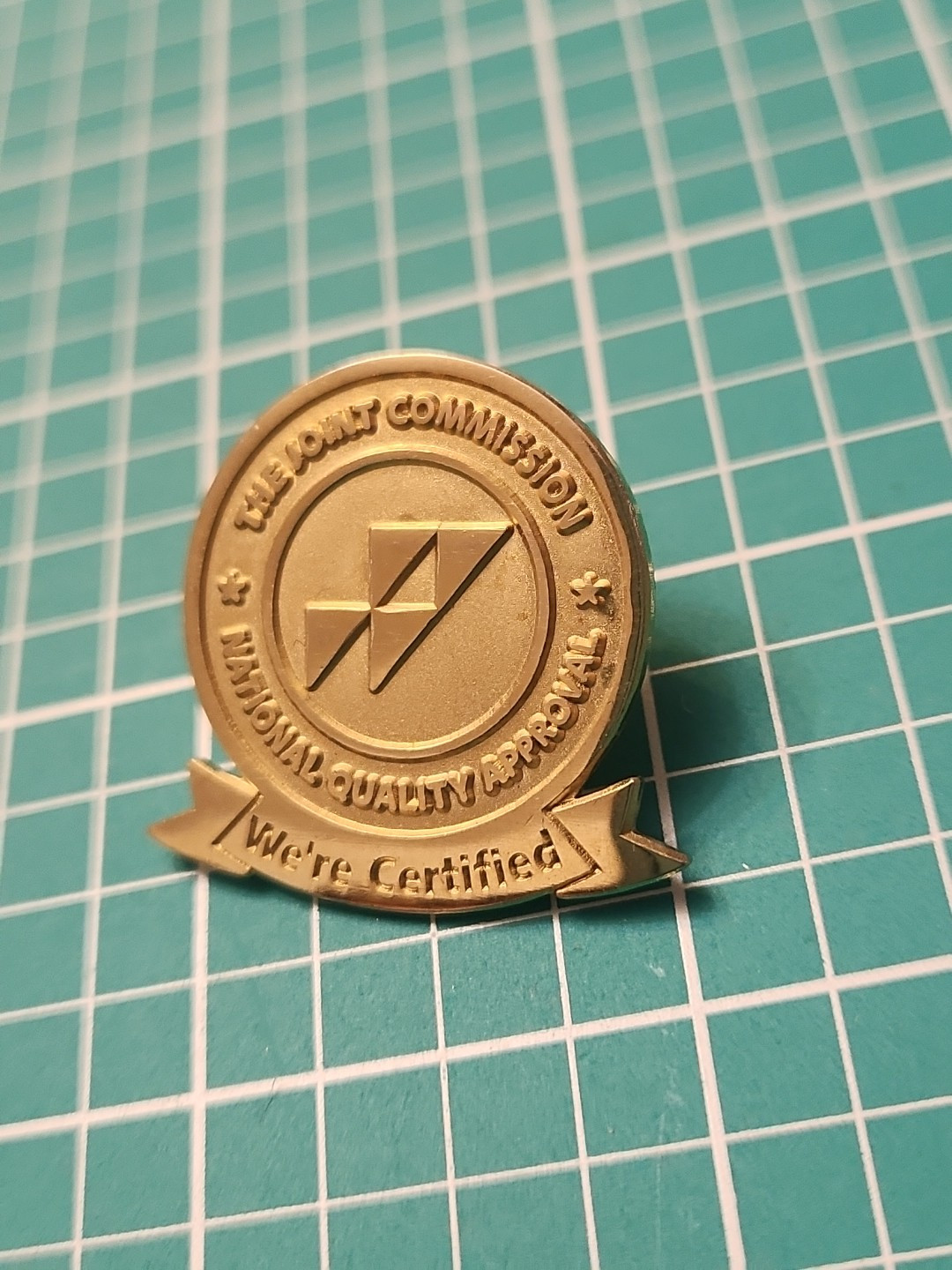 Vtg The Joint Commission National Quality Approval Gold Tone Lapel Pin