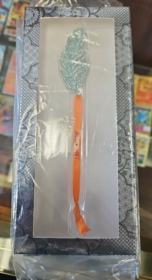 Taylor Swift ~ The Life of A Showgirl Feather Ornament Brand New