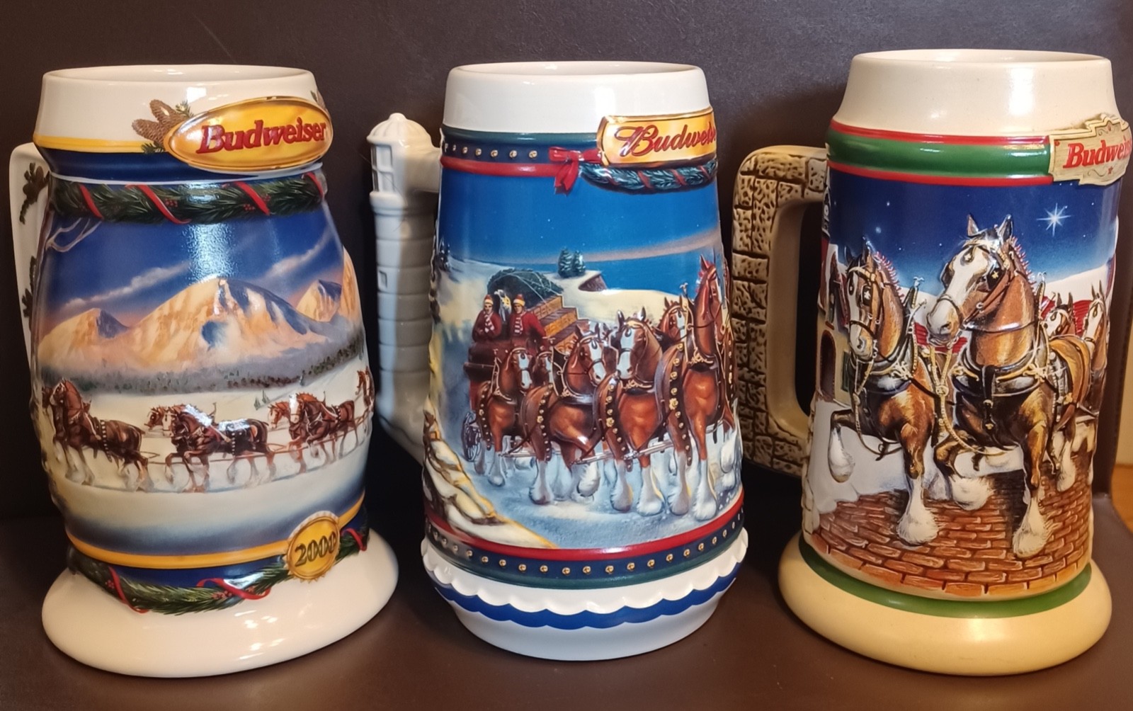 Three Vintage Budweiser Beer Steins, 1998, 2000, 2002, Clydesdales In Snow Three Vintage Budweiser Beer Steins, 1998, 2000, 2002, Clydesdales In Snow