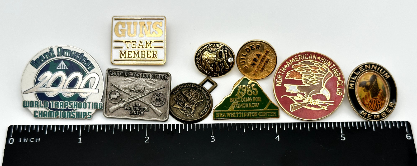 EIGHT ASSORTED VINTAGE NRA - HUNTING - SHOOTING PINS + FOB - L700