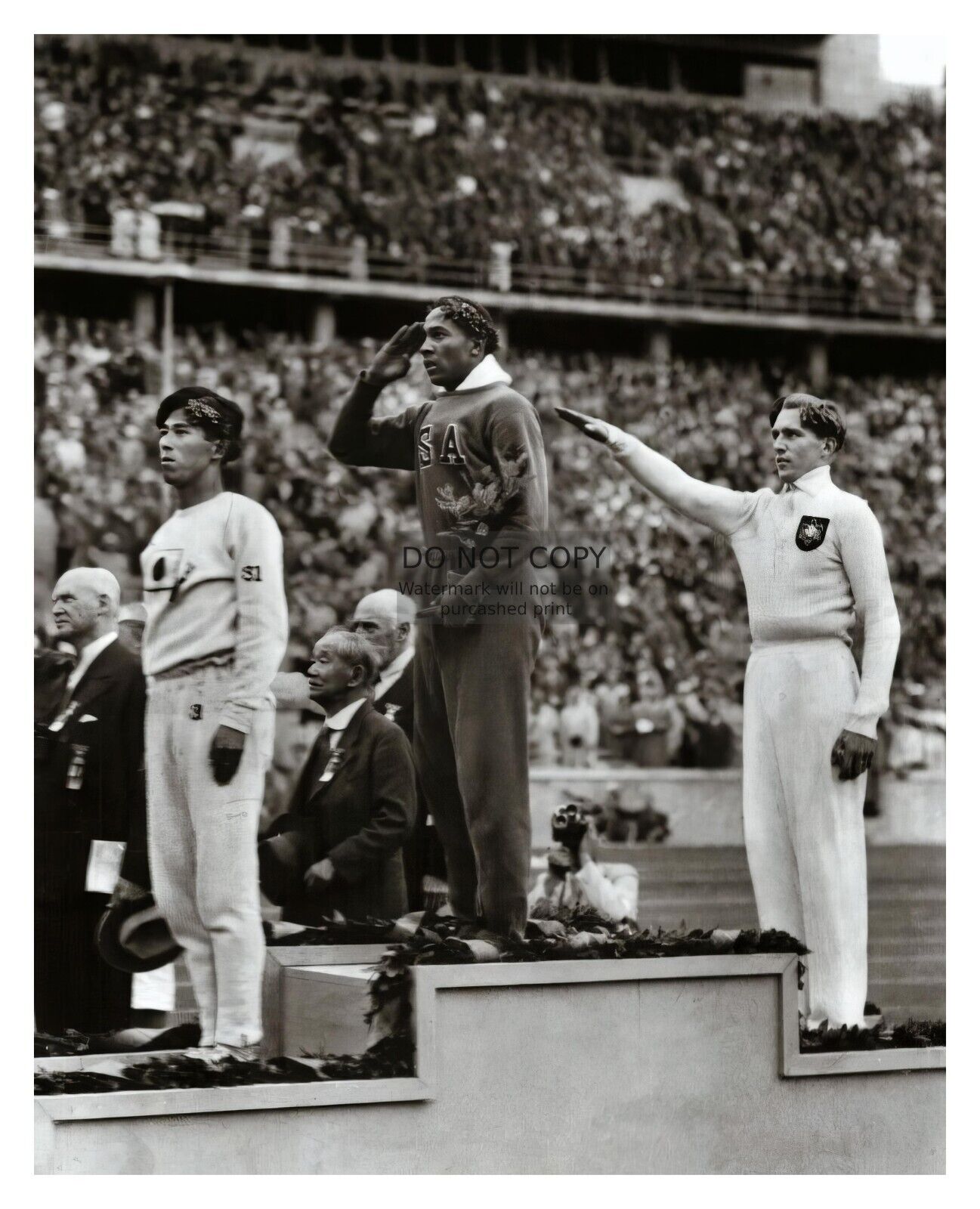 JESSIE OWENS STANDING ON PODIUM AT 1936 OLYMPICS BERLIN GERMANY 8X10 B&W PHOTO