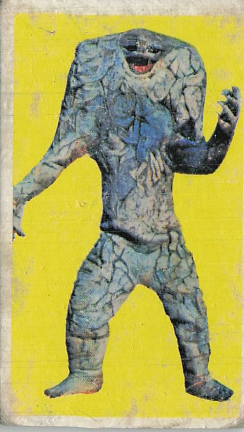 Vintage Japanese Rock Monster Kaiju Yellow Background Card