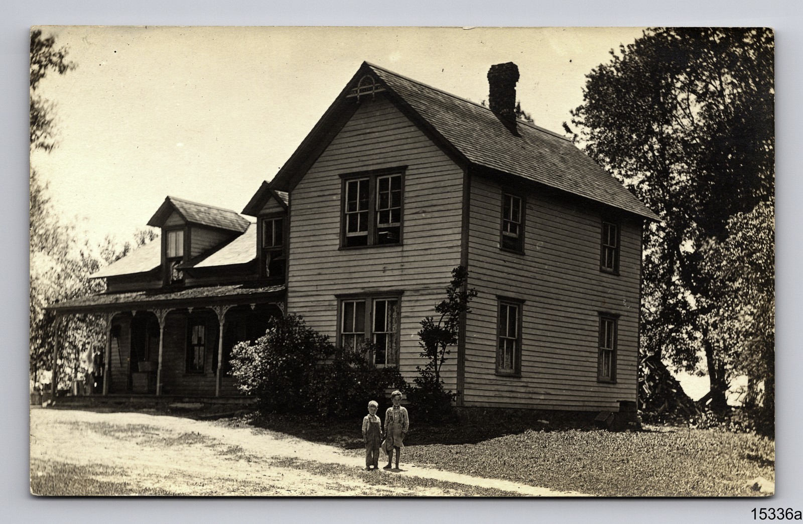 RPPC Two Boys Brothers at Large Two Story Home Real Photo Postcard