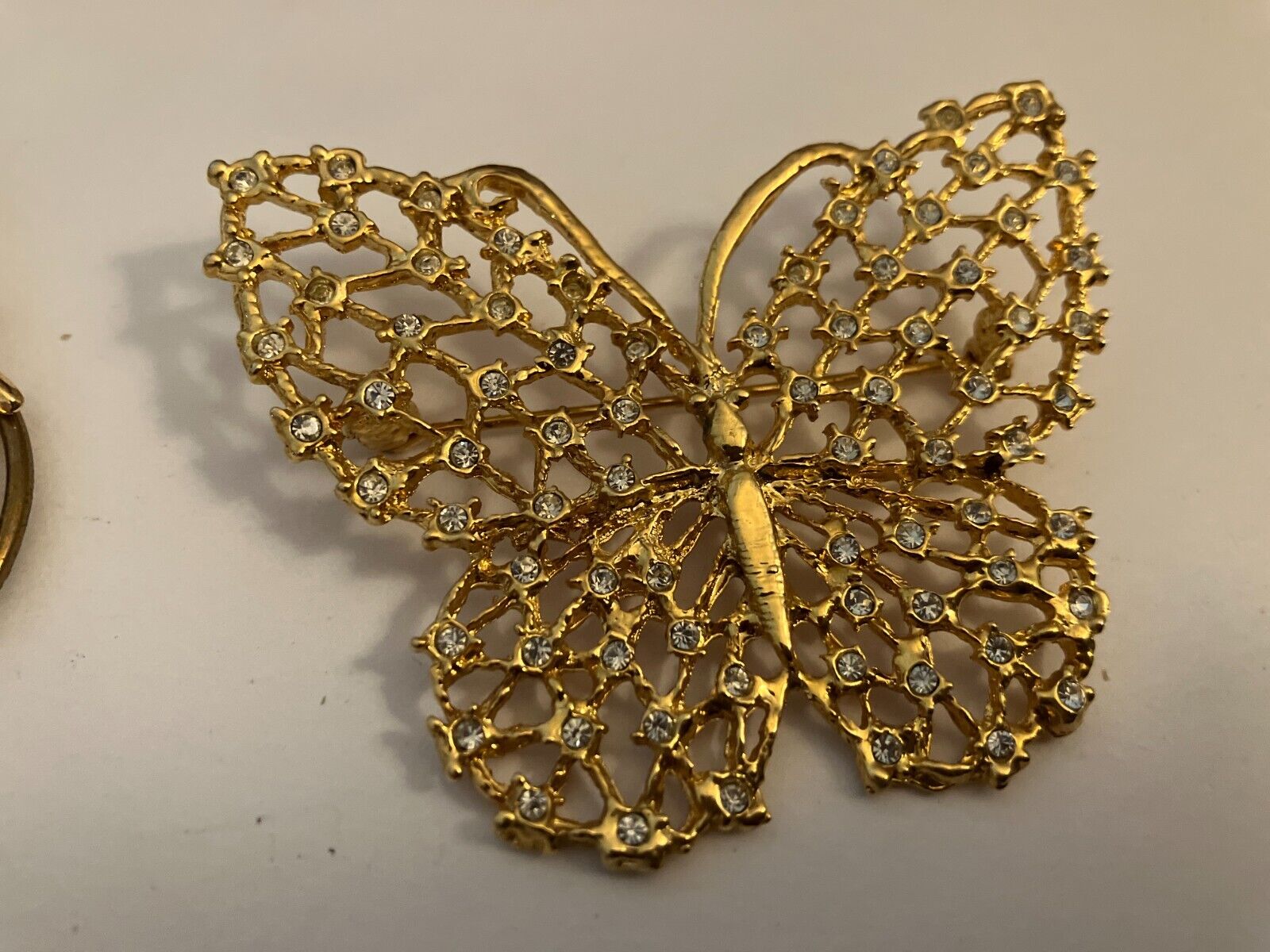VINTAGE ESTATE large rhinestone on gold tone butterfly figural brooch