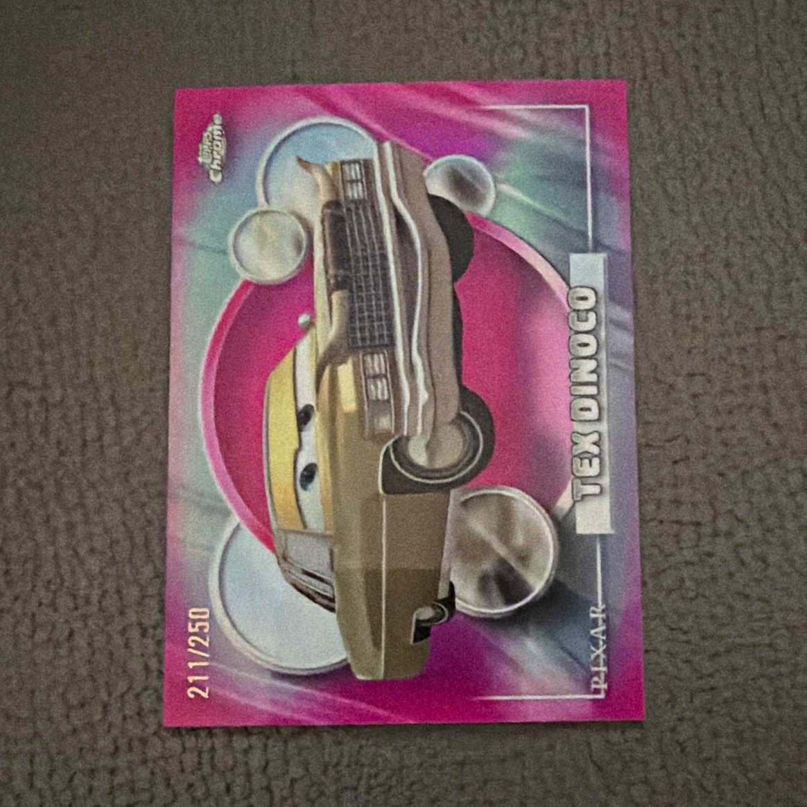 Topps 2006 Disney/Pixar Cars #19 Tex Dinoco Serial Numbered 21/250