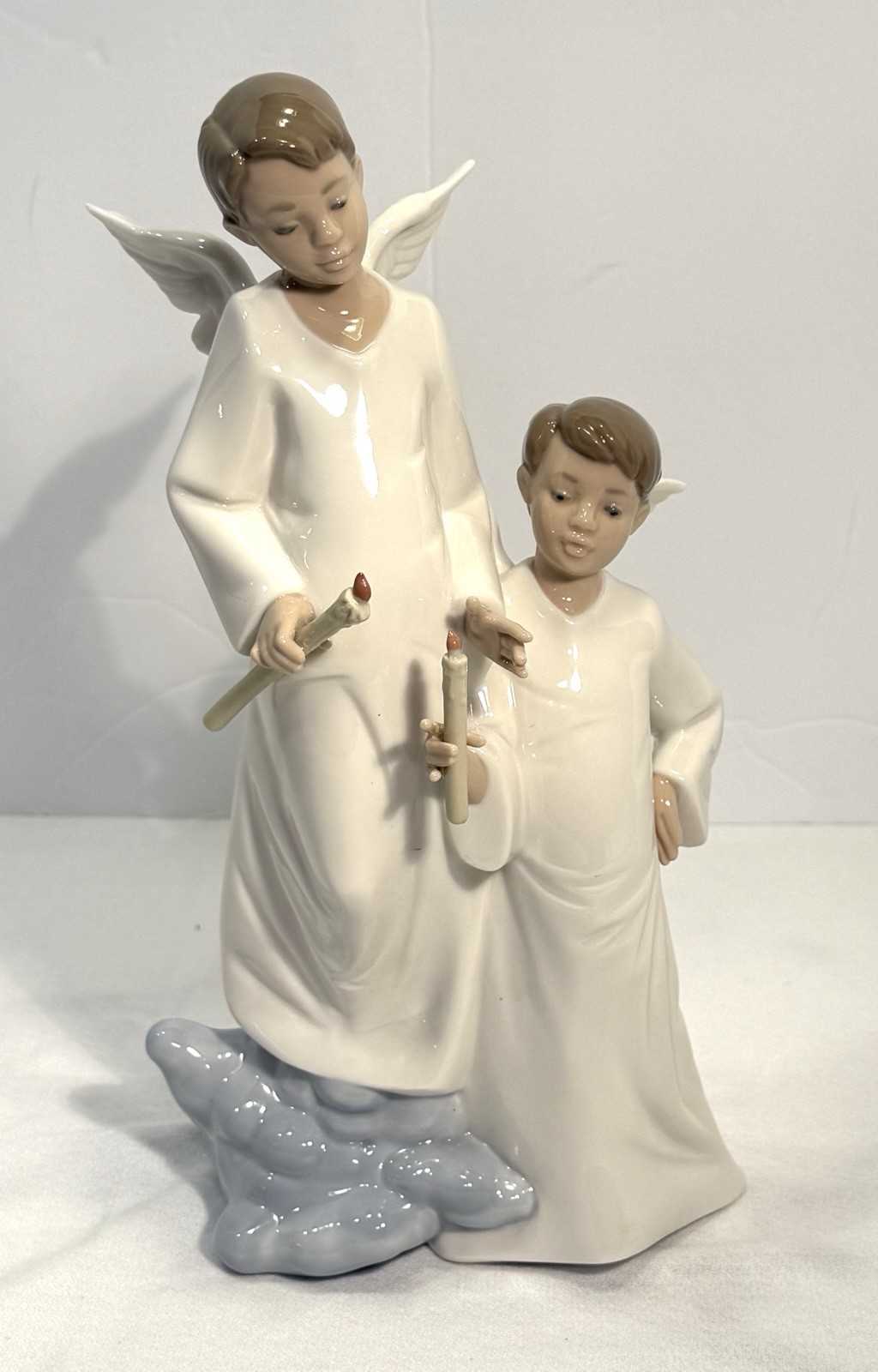 Nao by Lladro Porcelain Figurine “Lighting the Heavens” #1335 No Box Nao by Lladro Porcelain Figurine “Lighting the Heavens” #1335 No Box