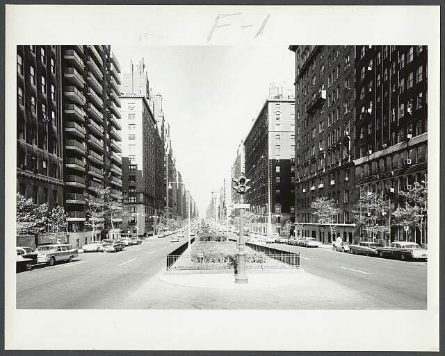 1959 City Street Intersection Gated Median High-Rise Buildings Downtown
