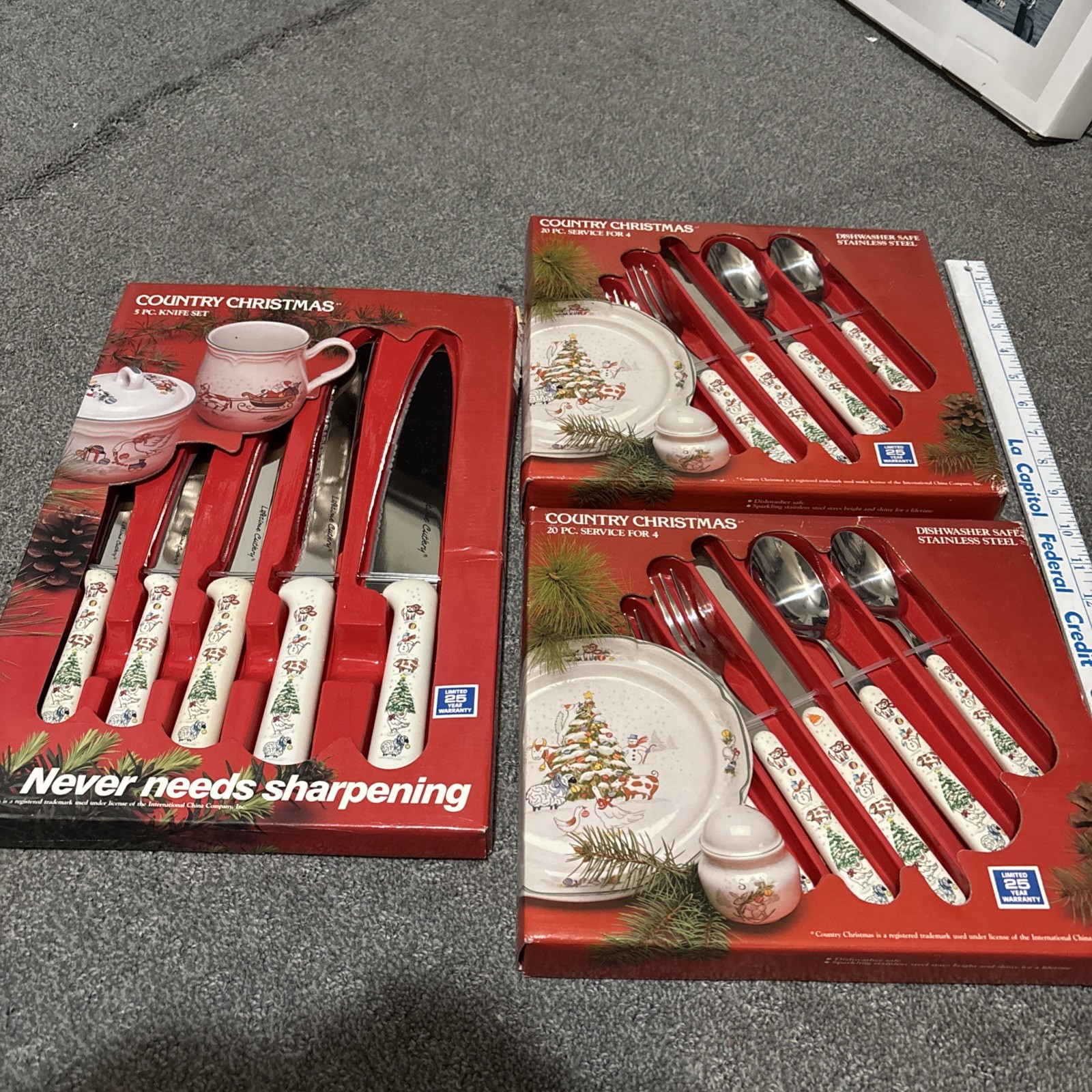 VNT  1988 country Christmas Stainless Steel 3 boxed NWT knife & (2) 20pc eatery.