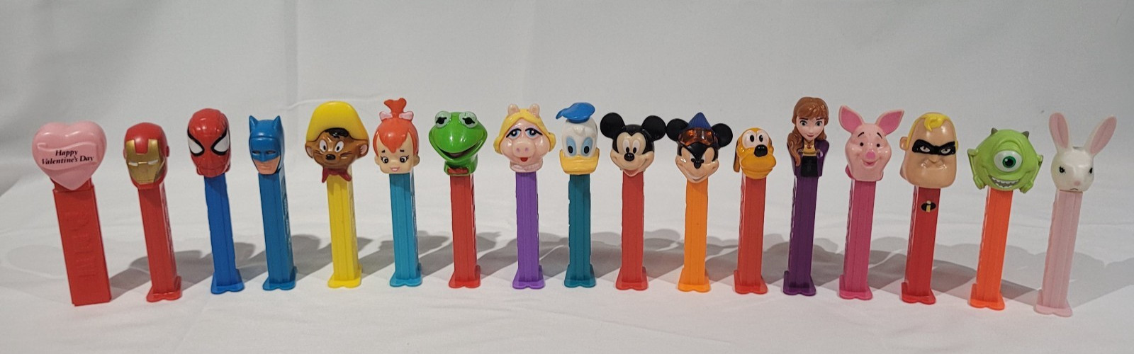 Lot of 17 Pez Dispensers Vintage Disney Muppets Marvel Batman Flintstones Looney