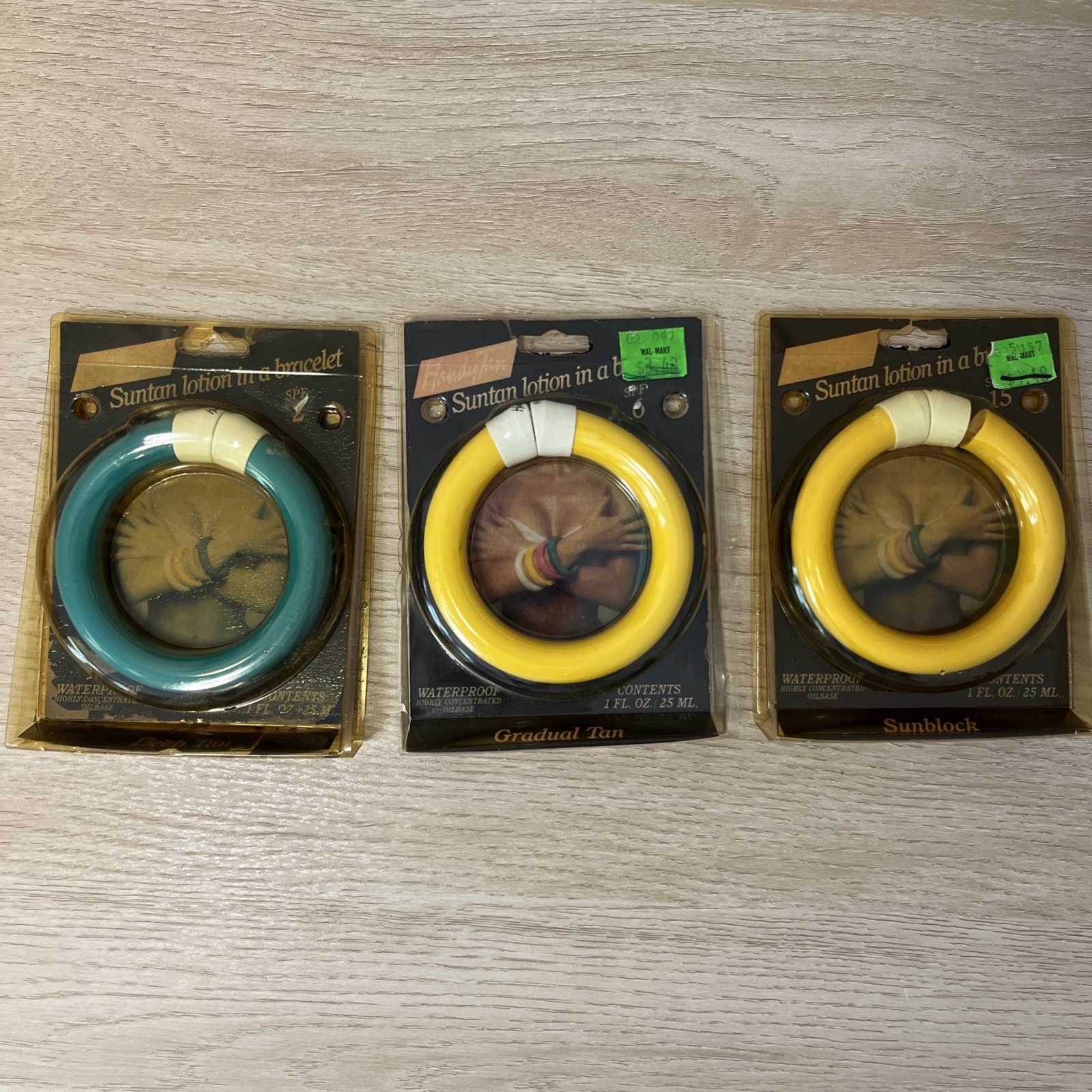 3 VTG HandyTan Suntan Lotion In A Bracelet 1980s Yellow Teal RARE Movie Prop