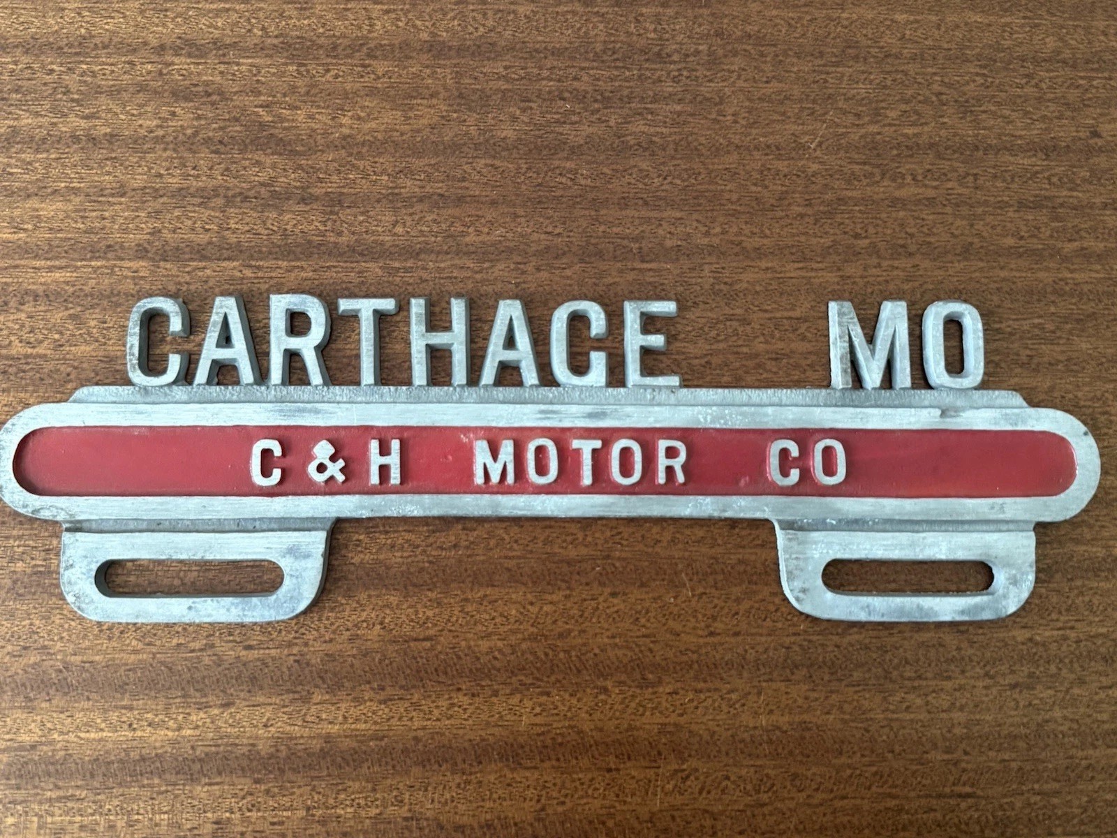 Vintage C&H Motor Co Carthage Missouri Advertising Cast License Plate Topper