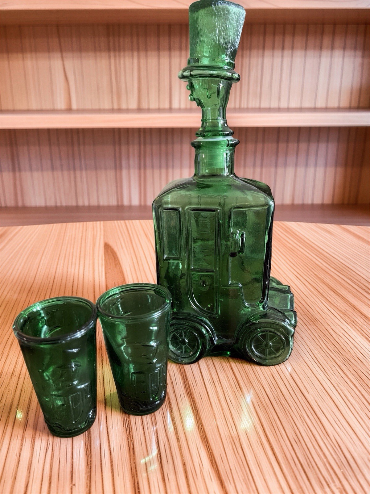 vintage green glass automobile liquor decanter and matching shot glasses BESSI