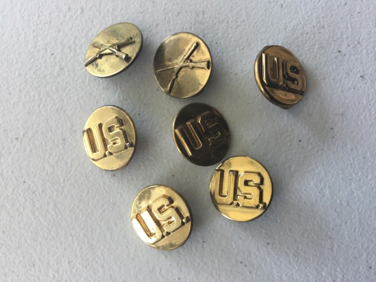 Lot of 7 US Infantry Collar Disc Pins 2 Crossed Rifles 5 US Brass