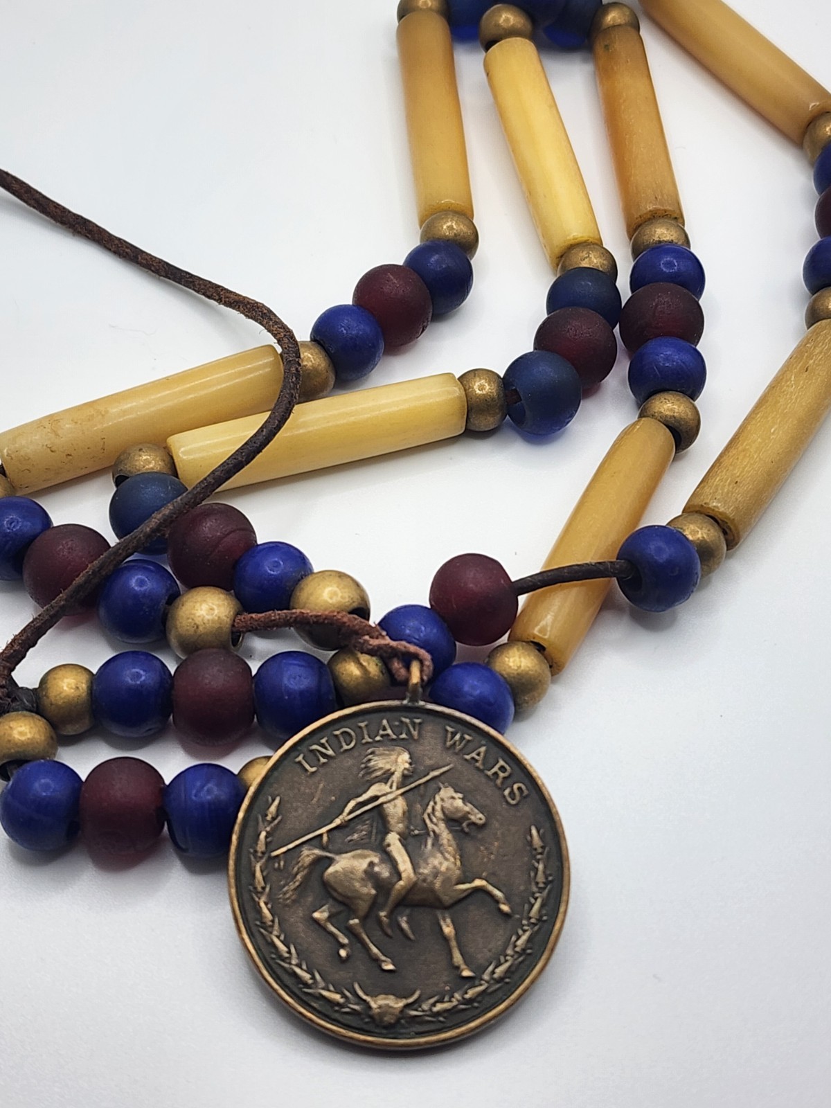 U.S. ARMY INDIAN WARS CAMPAIGN MEDAL on Hand made beads and bone beads U.S. ARMY INDIAN WARS CAMPAIGN MEDAL on Hand made beads and bone beads