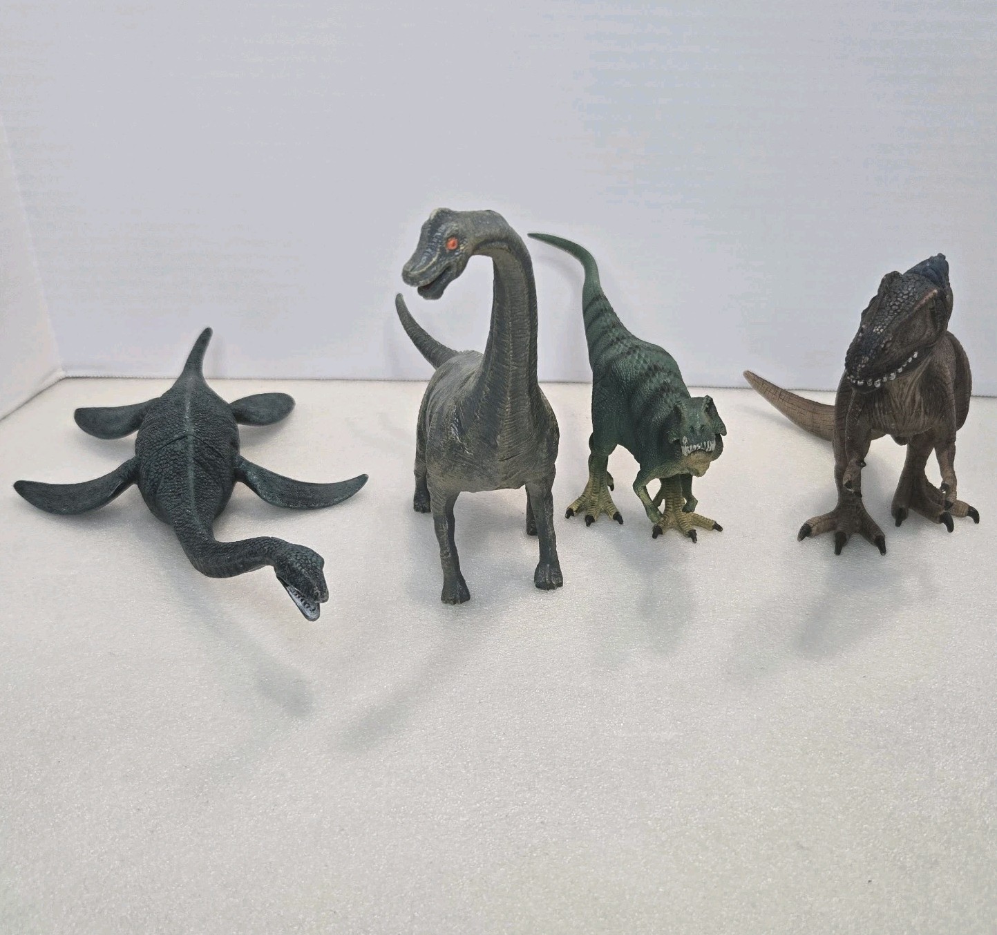 Schleich Dinosaur Lot Of 4 Adult TRex Juvenile TRex Plesiosaurus Brachiosaurus