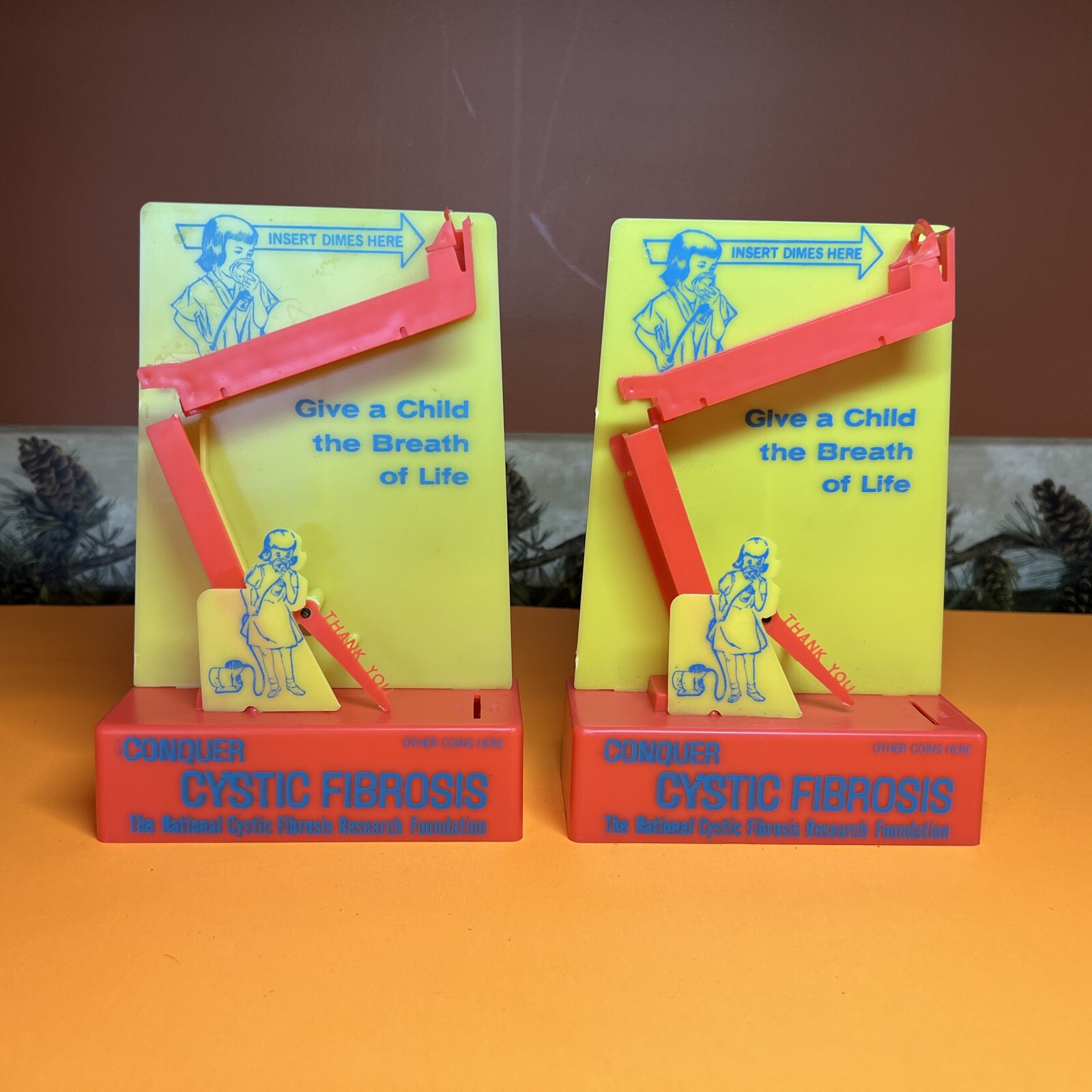 LOT OF 2 Conquer Cystic Fibrosis Dime Donation Collector Tigrett Industries