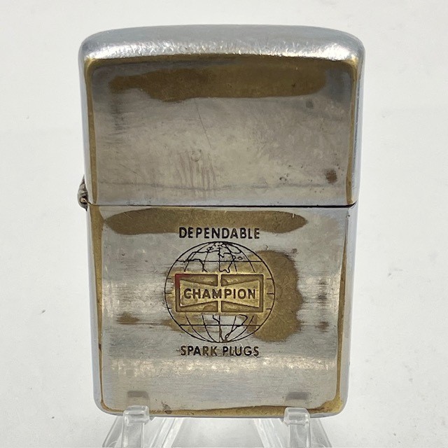 Vintage Zippo 1964 Champion Spark Plugs Globe Logo