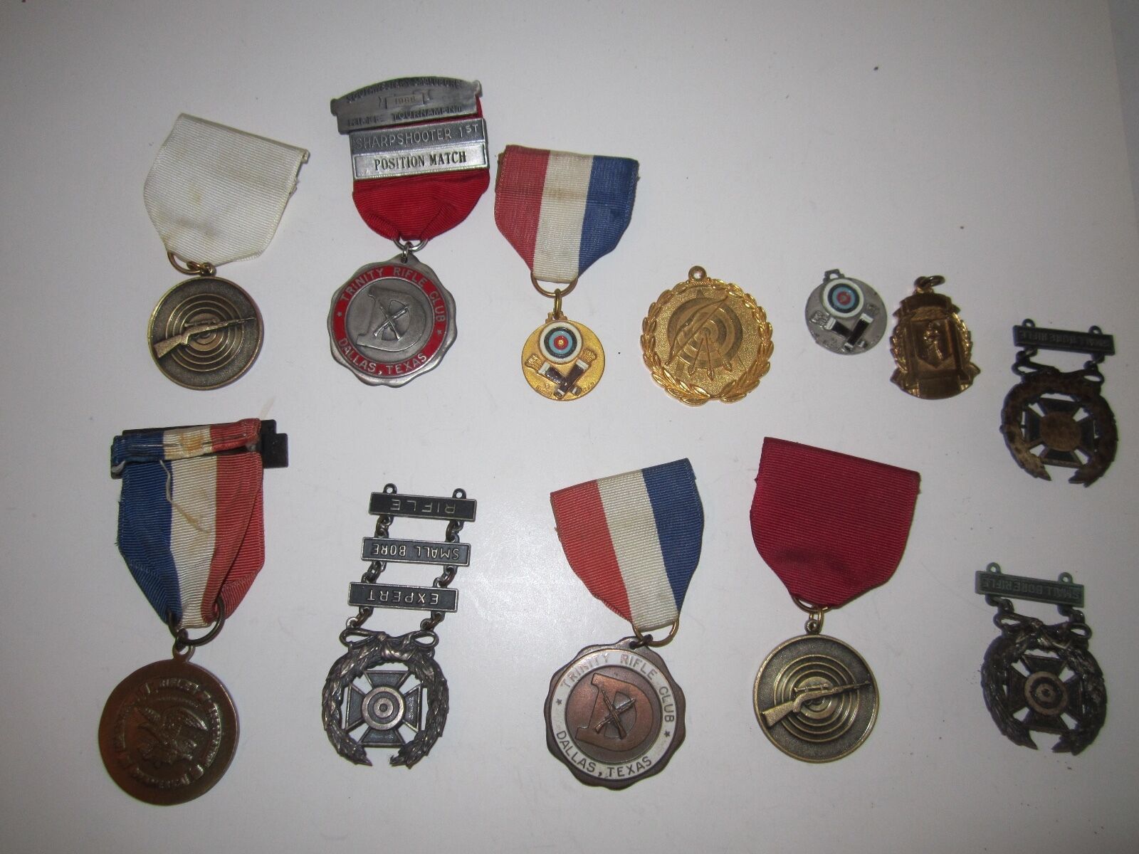 12 VTG ARCHERY & RIFLE SHOOTING MEDALS - SEE PICS - NICE - OFC-C
