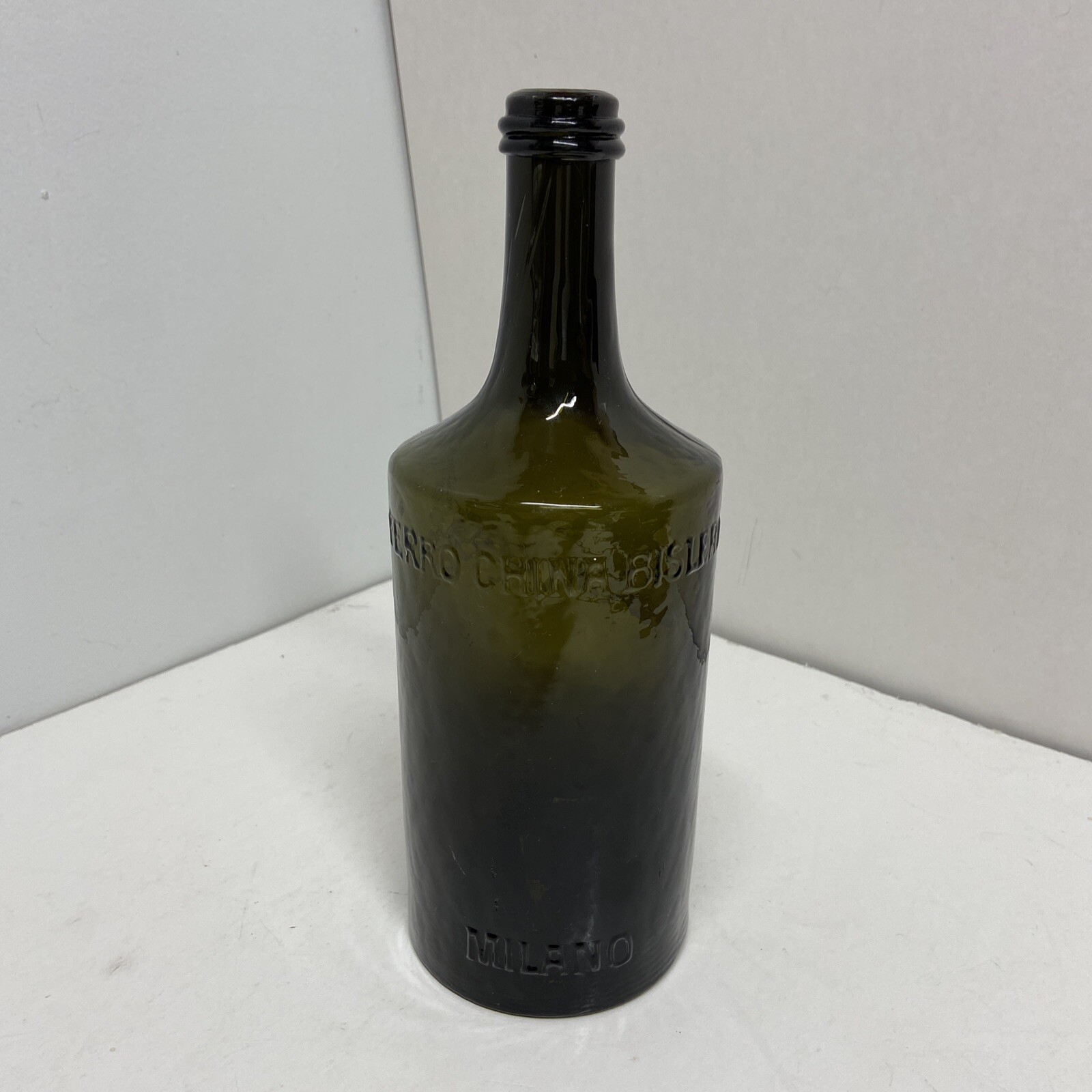 CRUDE 1881 WHITTLED OLIVE GREEN FERRO CHINA BISLERI MILANO SEEDED TONIC BOTTLE