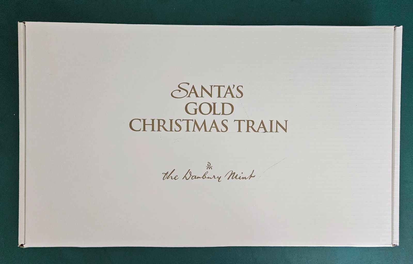 The Danbury Mint Santa’s Gold Christmas Train - Original Box & Certification