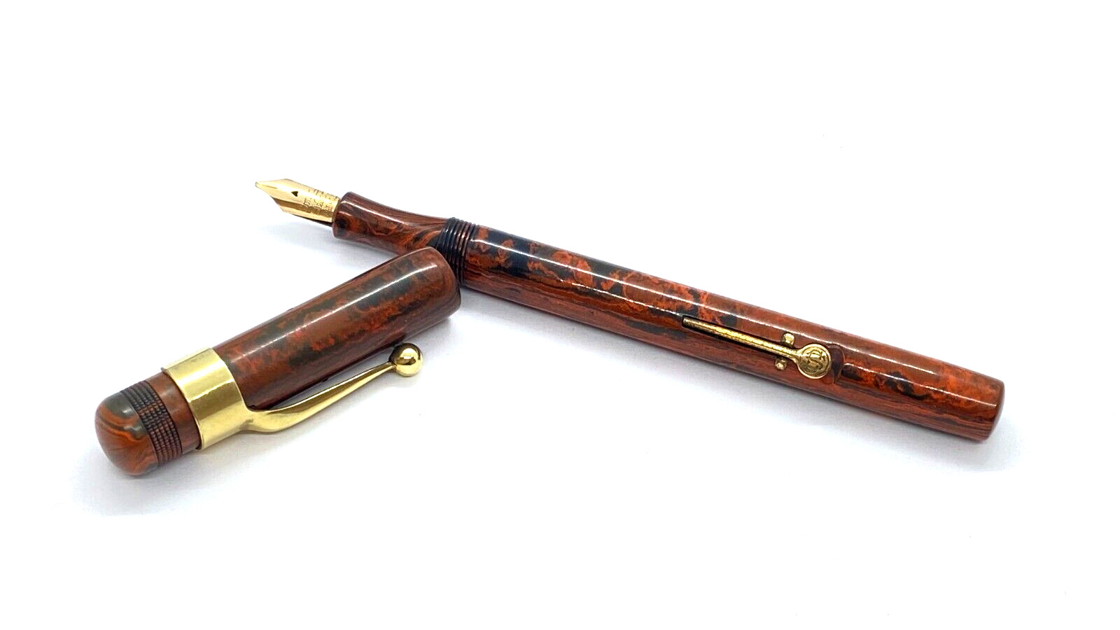 THE CONWAY STEWART PEN IN RED MOTTLED, SPRINGY 14K OBLIQUE BROAD NIB ENGLAND