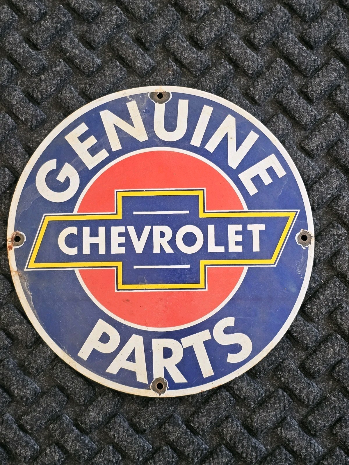 VINTAGE WE USE GENUINE CHEVROLET PARTS PORCELAIN SIGN. VINTAGE WE USE GENUINE CHEVROLET PARTS PORCELAIN SIGN.
