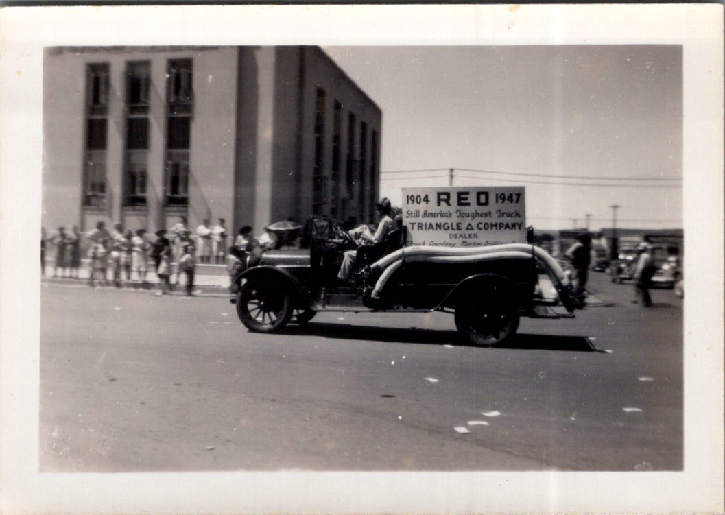 1947 REO Truck Parade Photo RED Triangle A Dealer Sign Crowd & Bunting 1947 REO Truck Parade Photo RED Triangle A Dealer Sign Crowd & Bunting