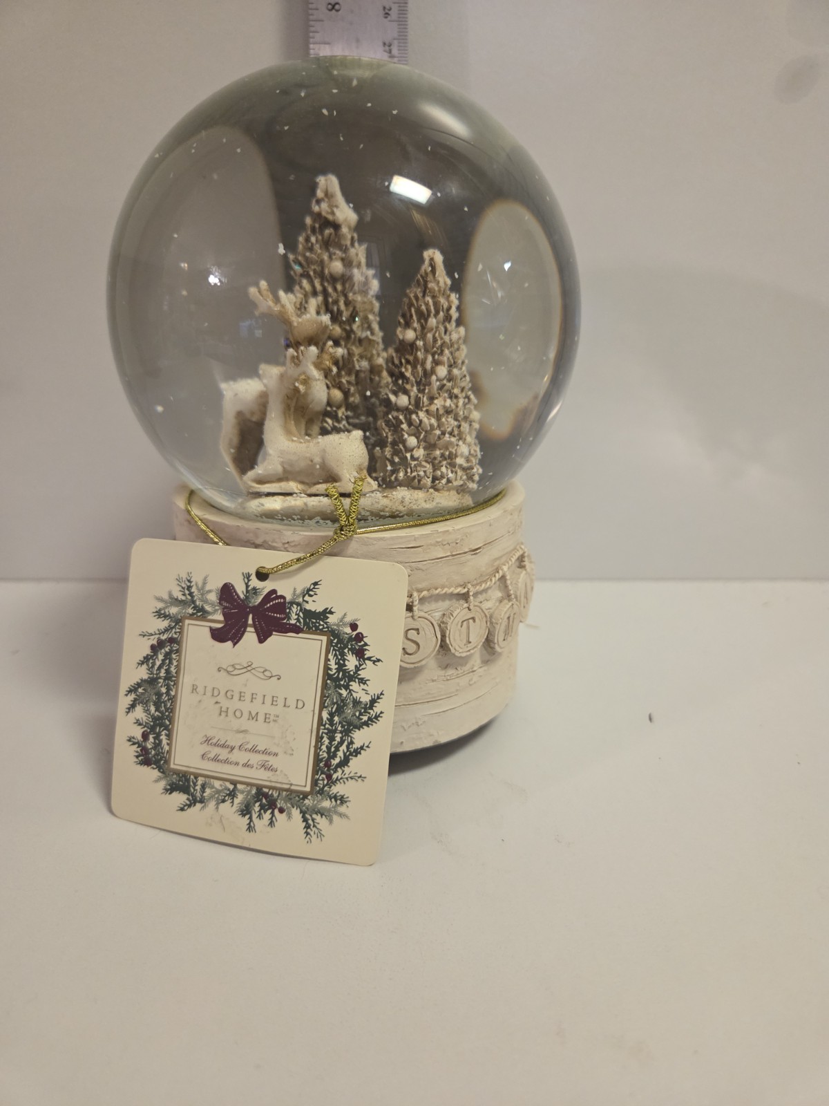 Ridgefield Home Holiday collection snow globe with music box measures 7 inches 