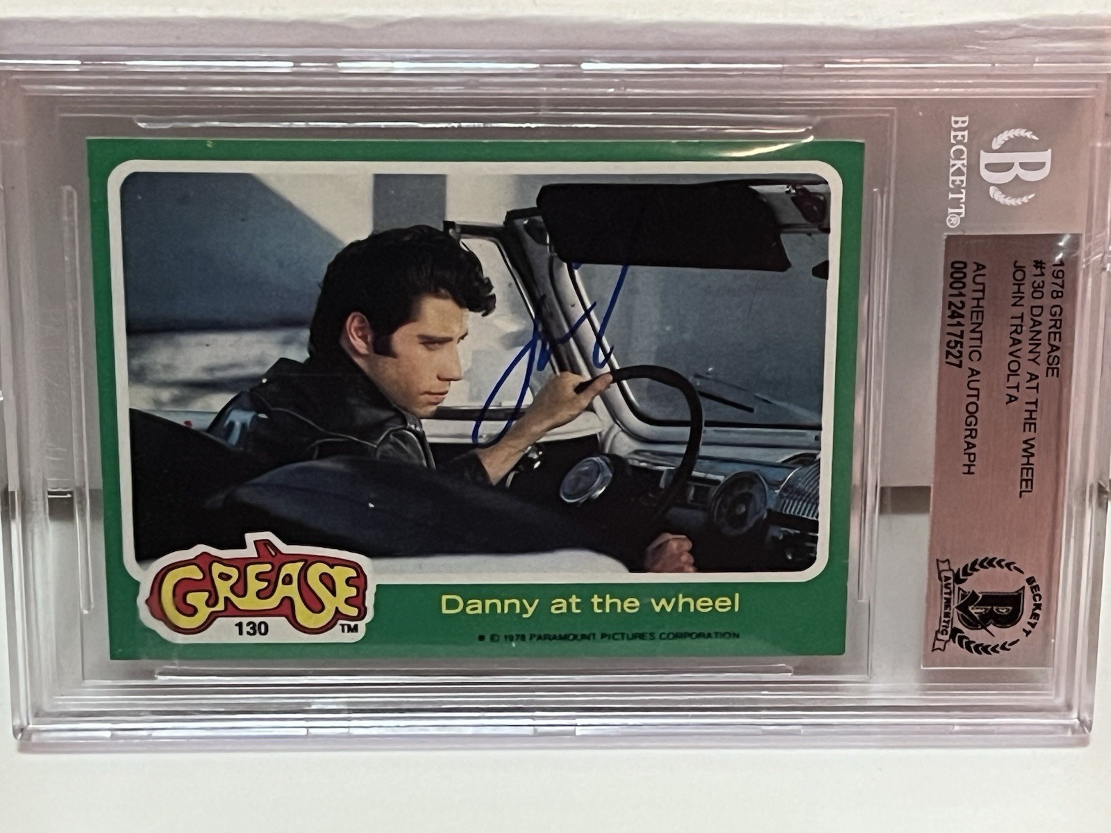 John Travolta Auto – 1978 Topps Grease #130 Danny At The Wheel Autograph BGS John Travolta Auto – 1978 Topps Grease #130 Danny At The Wheel Autograph BGS